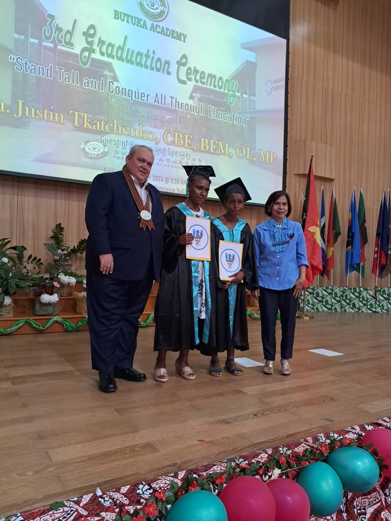 Hon Tkatchenko presenting ITI scholarship at Butuka Academy